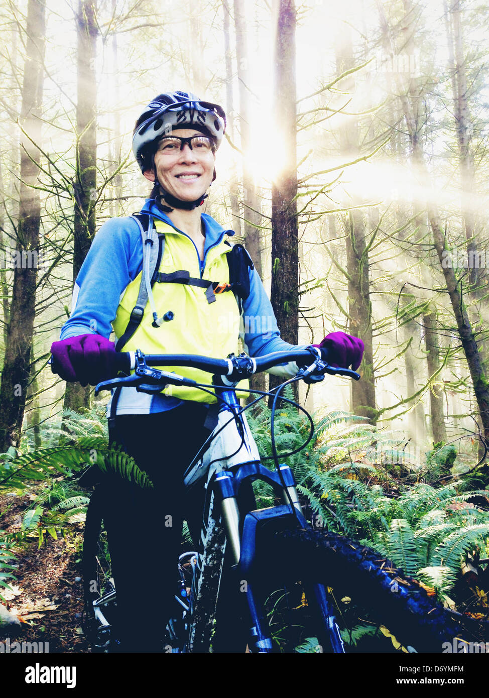 Japanese woman riding mountain bike Stock Photo Alamy