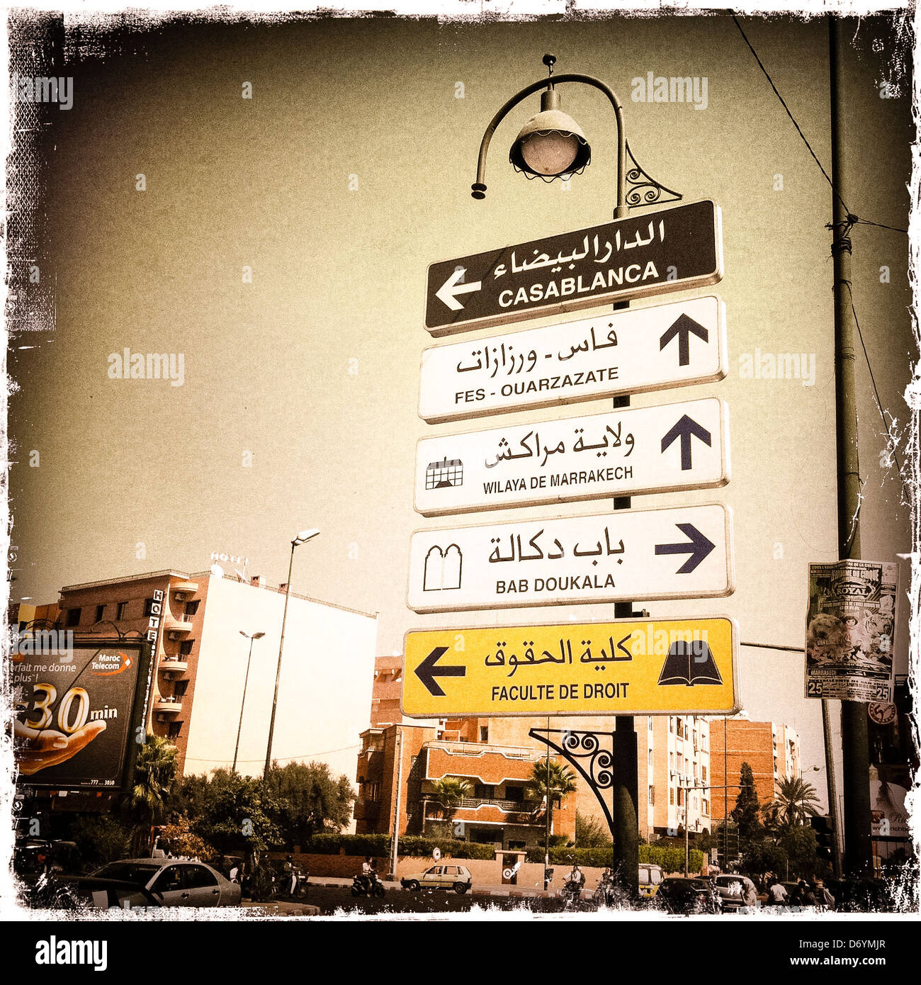 Distressed photograph of Arabic signs in city center, Marrakech, Morocco Stock Photo