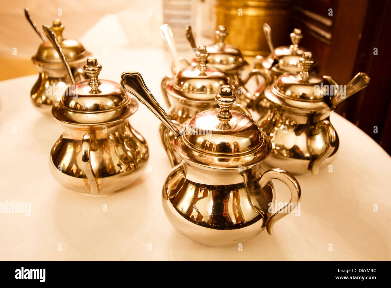 Viennese sugar bowls - Metal sugar containers in traditional Viennese coffee house 'Demel', Vienna, Austria Stock Photo