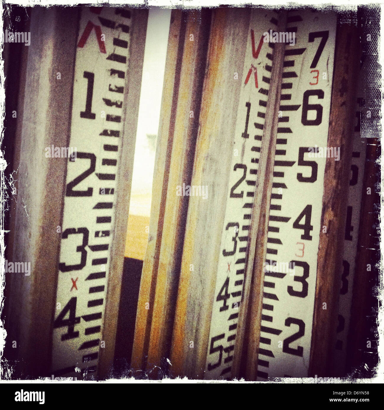 Distressed photograph of oversized rulers - Smartphone Captured Stock Image