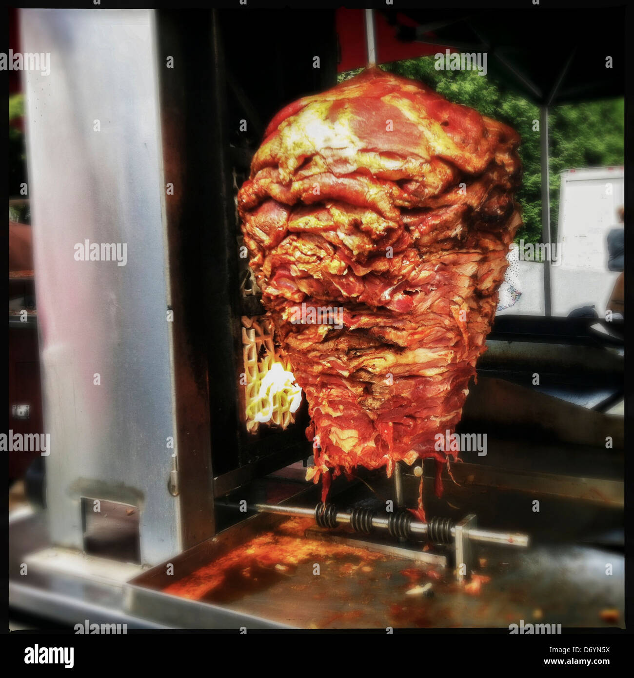 Meat grilling on skewer - Smartphone Captured Stock Image