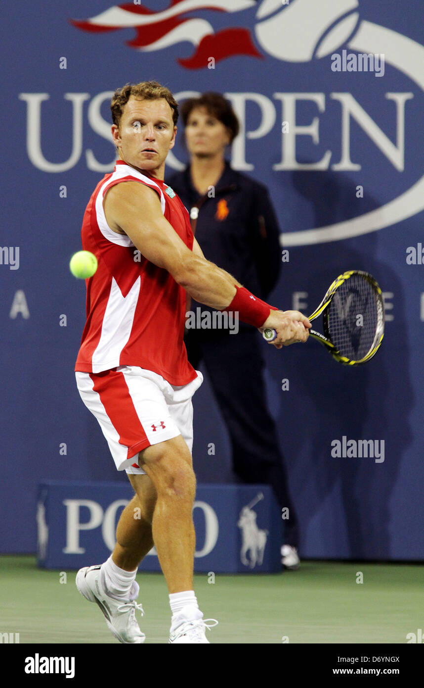 Michael Russell of the United States plays against Andy Roddick of the United States during Day Three of the 2011 US Open at Stock Photo