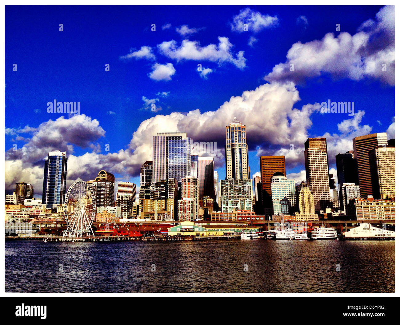 Dramatic clouds over city skyline, Seattle, Washington, United States - Smartphone Captured Stock Image