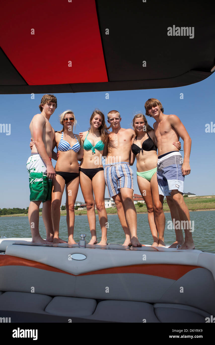 USA, Texas, Lewisville, Teenagers having fun on ski boat at Lake