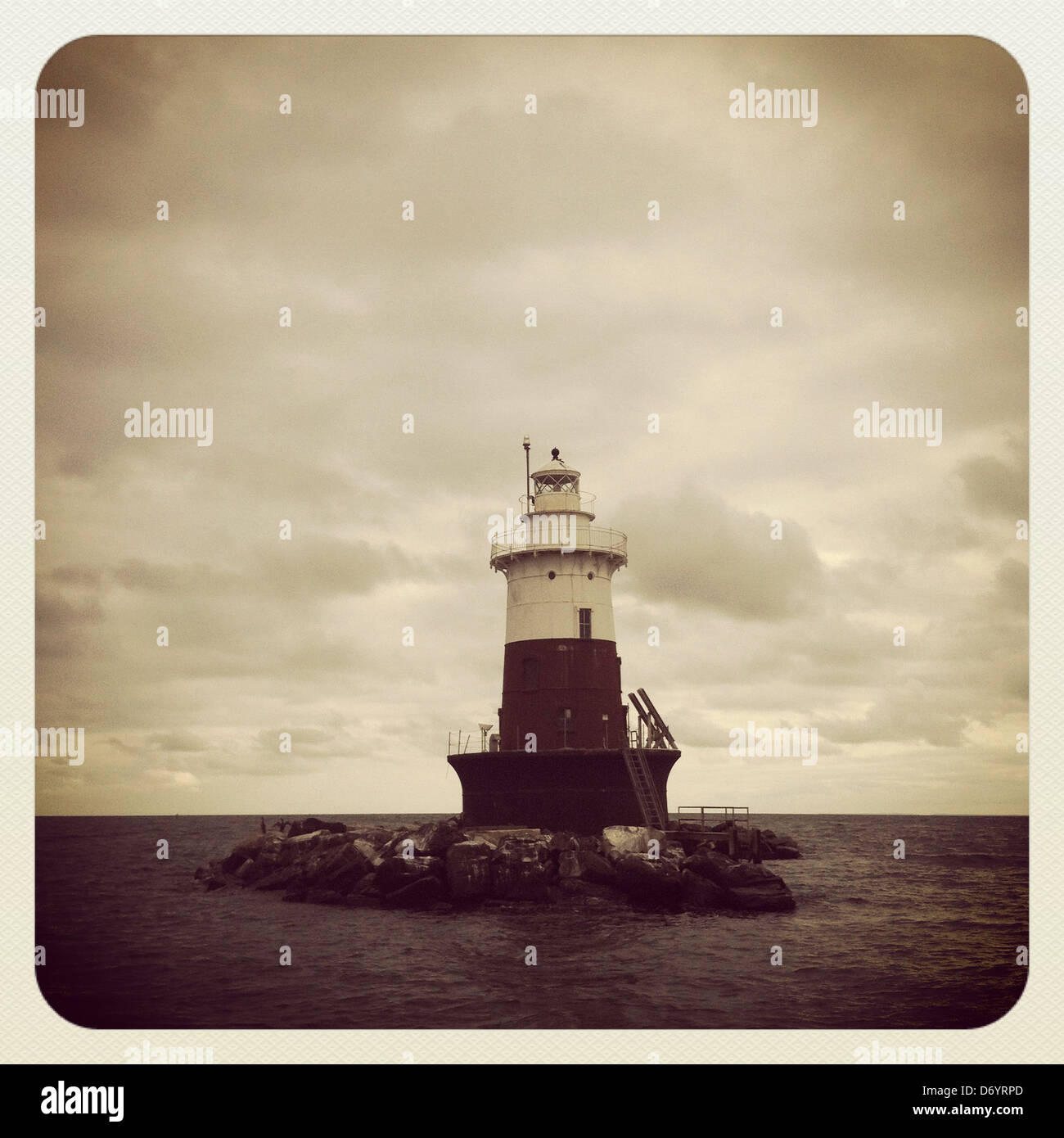 Lighthouse on rocky island, Rowayton, Connecticut, United States Stock