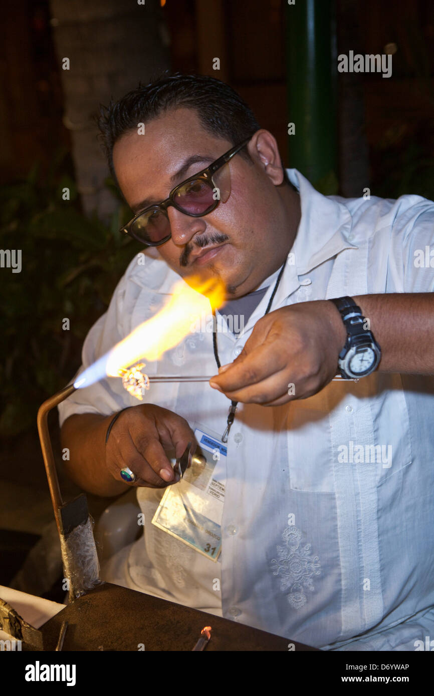 Glass Blower creating tourist trinkets, Puerto Vallarta, Mexico Stock