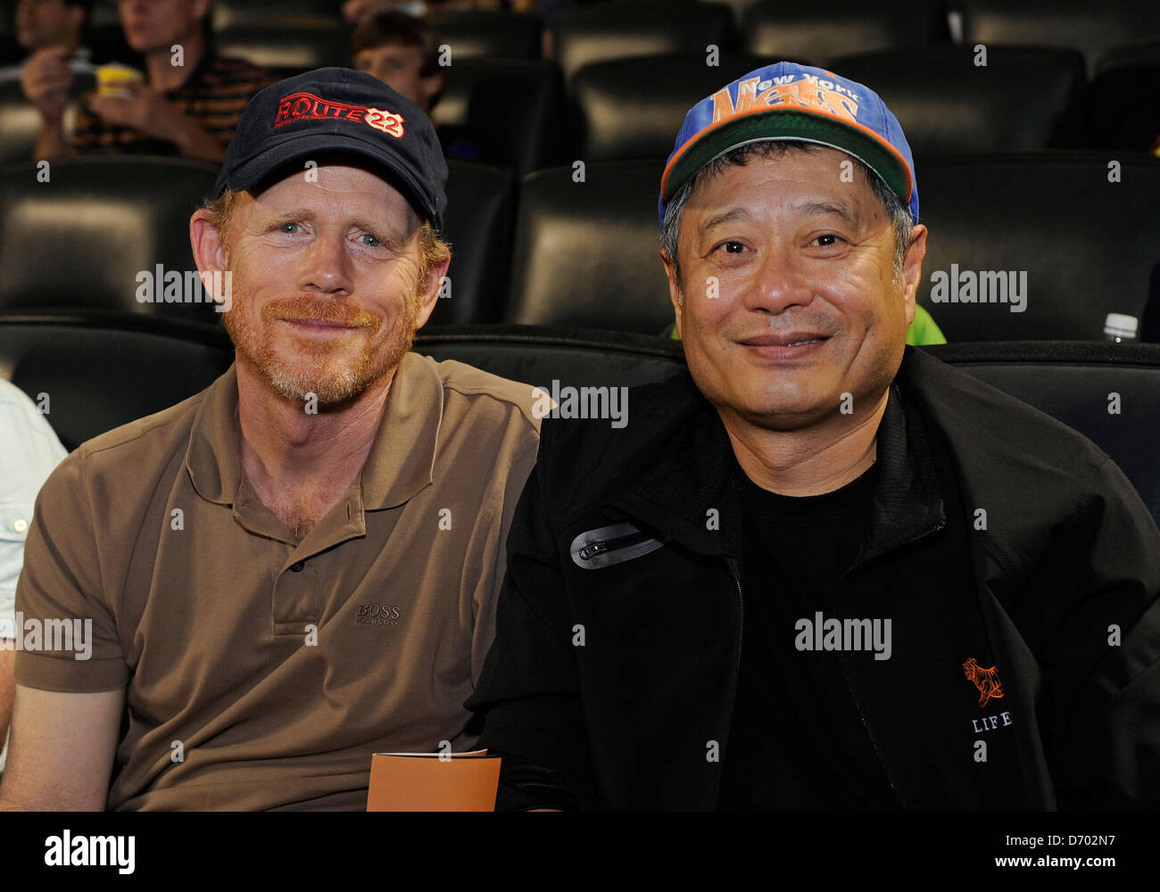 Ron Howard and Ang Lee are seen in the stands at the Mets vs. Atlanta Braves game held at Citifield Stadium in Queens New York City, USA - 26.08.11 C Stock Photo