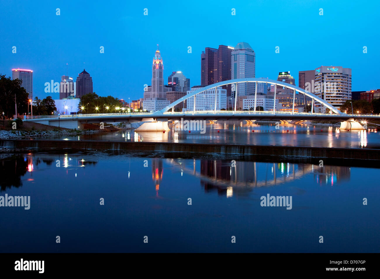 Downtown Skyline of Columbus, Ohio with the Main Street  Bridge over the Scioto River in the foreground Stock Photo