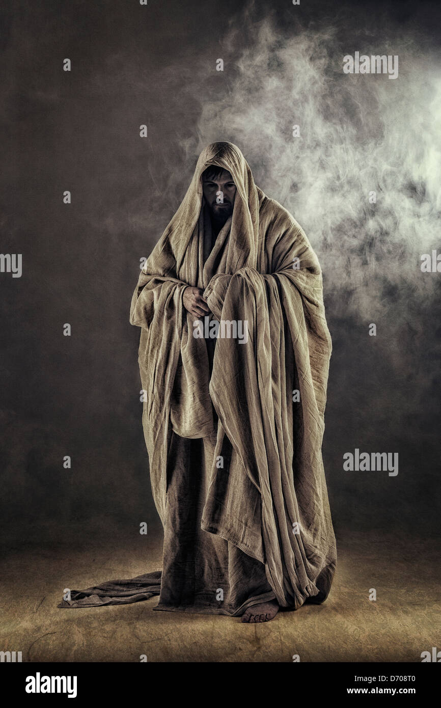 cloaked figure in smoke Stock Photo - Alamy