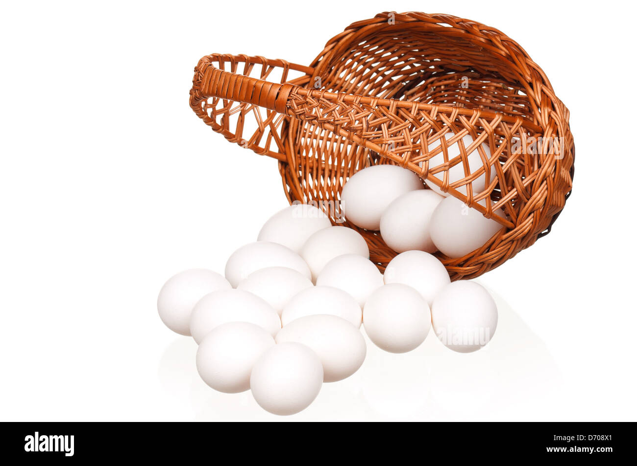 Eggs in wicker basket Stock Photo