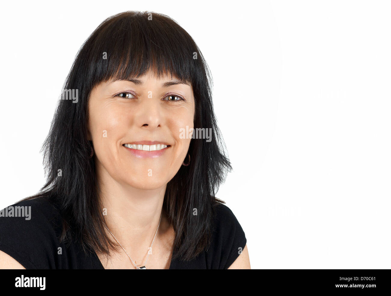 Portrait of smiling middle aged woman Stock Photo