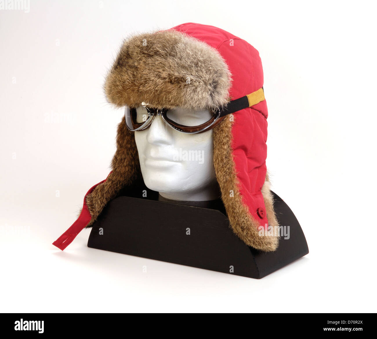 vintage racing googles and hat isolated Stock Photo