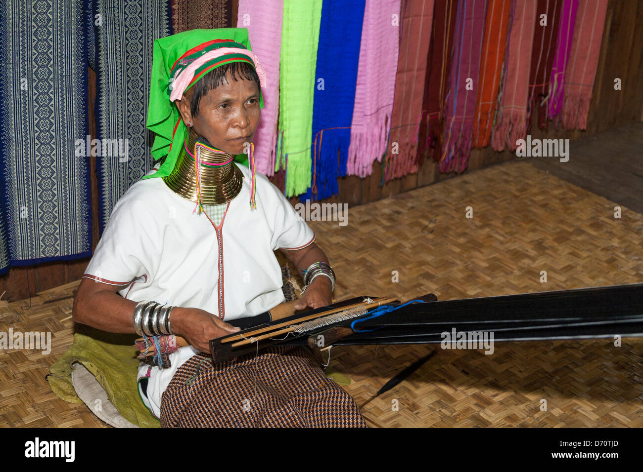 Woman with long neck from the Padaung tribe weaving, Ywama village, Inle Lake, Shan State, Myanmar, (Burma) Stock Photo