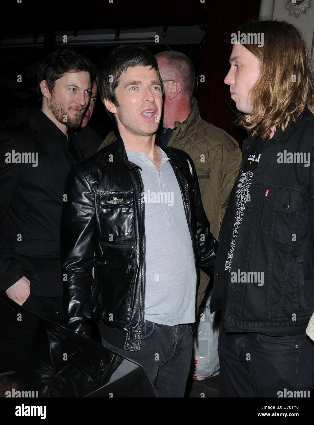 Noel Gallagher in high spirits as he departs Brit Awards 2012 - Sony Music Afterparty at the Arts Club - Outside London, Stock Photo