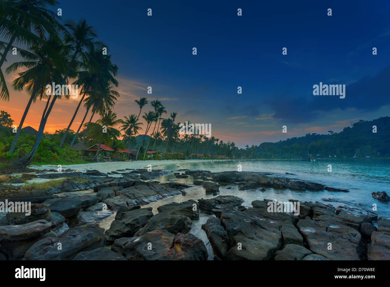 sunrise on a tropical beach Stock Photo - Alamy