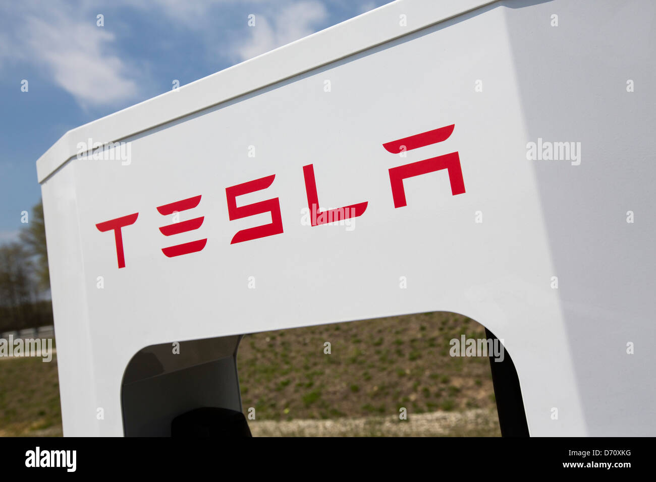 A Tesla electric vehicle Supercharging Station along Interstate 95 in Delaware.  Stock Photo
