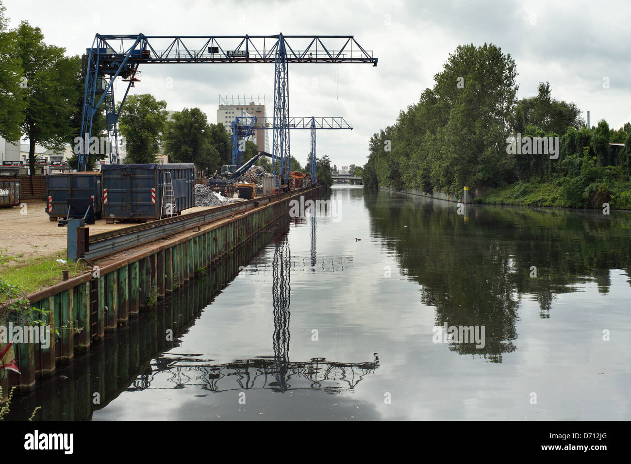 Berlin, Germany, Portalkraene a Schrotthaendlers on a navigable canal Stock Photo