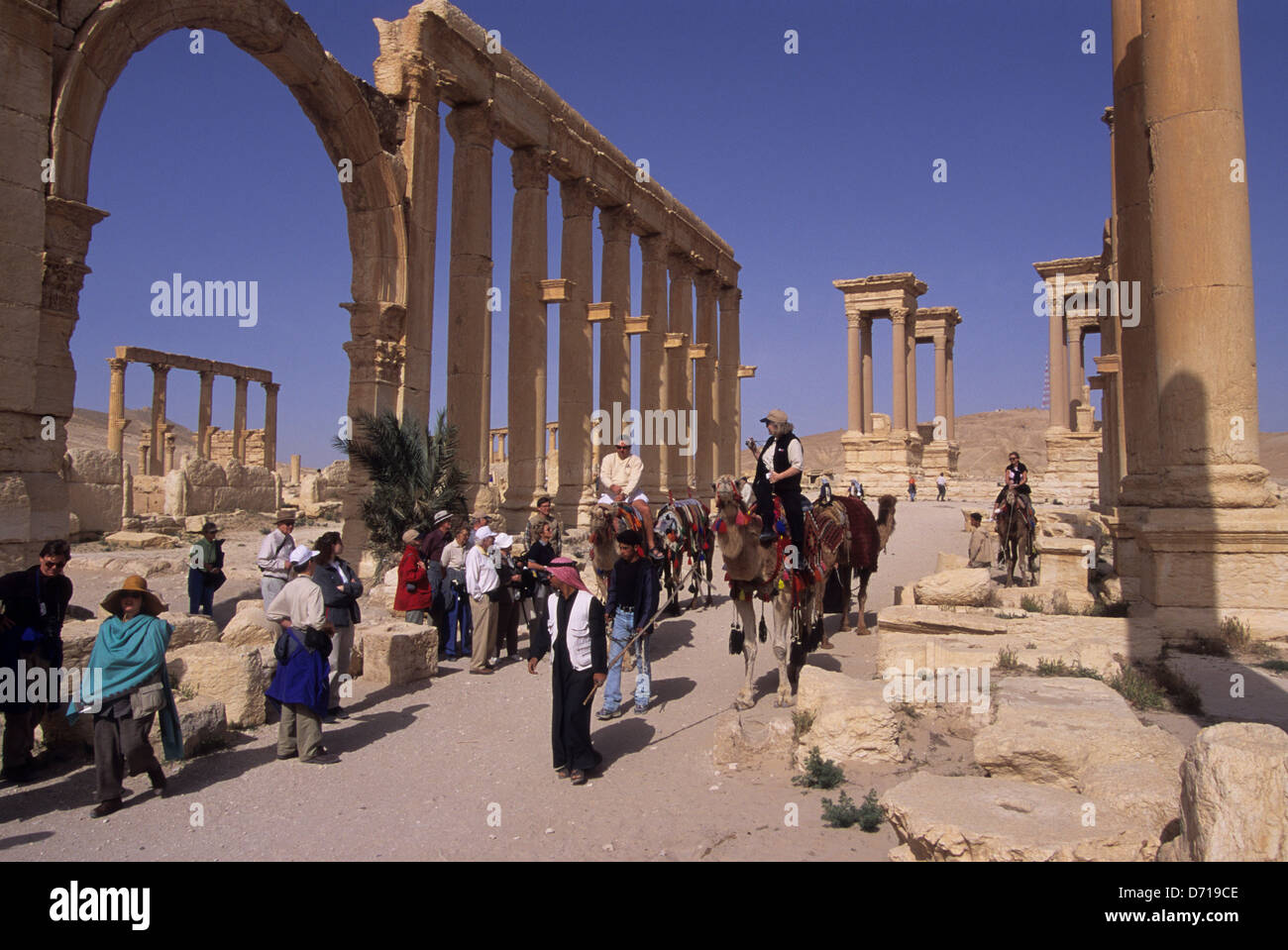 Syria, Palmyra, Ancient Roman City, Colonnaded Street, Tourists Riding ...
