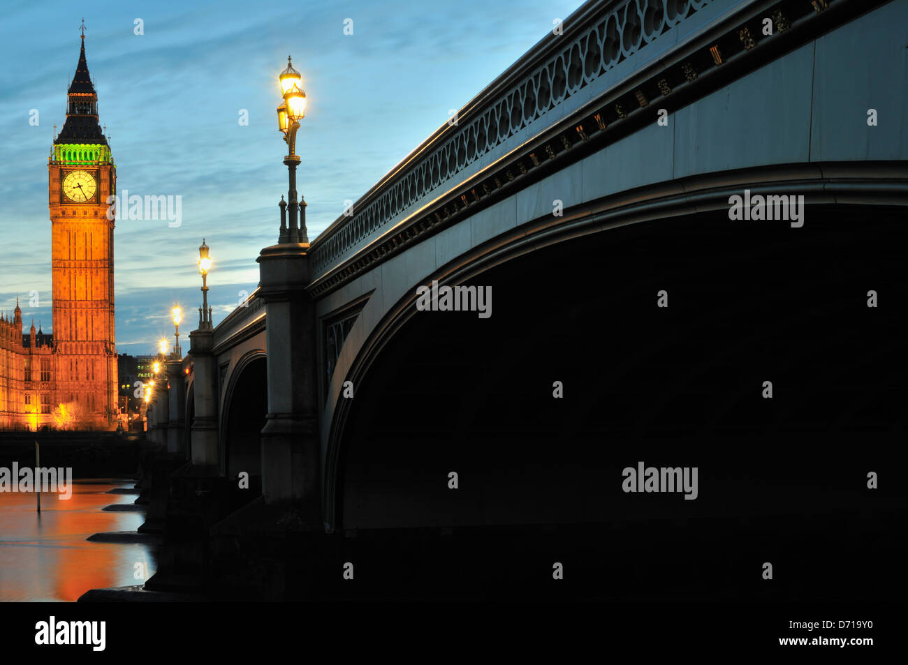Westminster Bridge and Big Ben clock tower, London UK, early evening, with floodlighting. Stock Photo