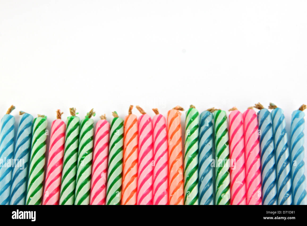 Colorful candles brought Sorted another. Stock Photo