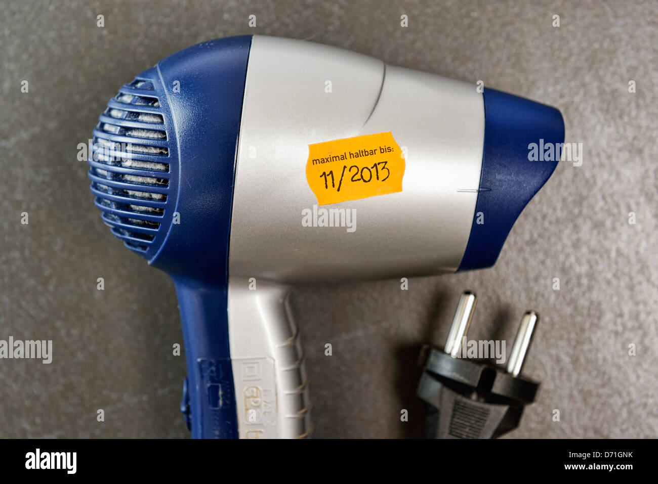 Hairdrier with durability date, built-in wearing parts in electrical appliances Stock Photo