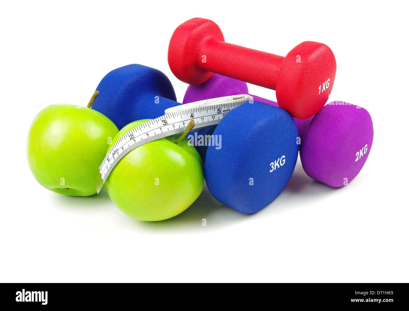 fitness items and fruit on a white background Stock Photo