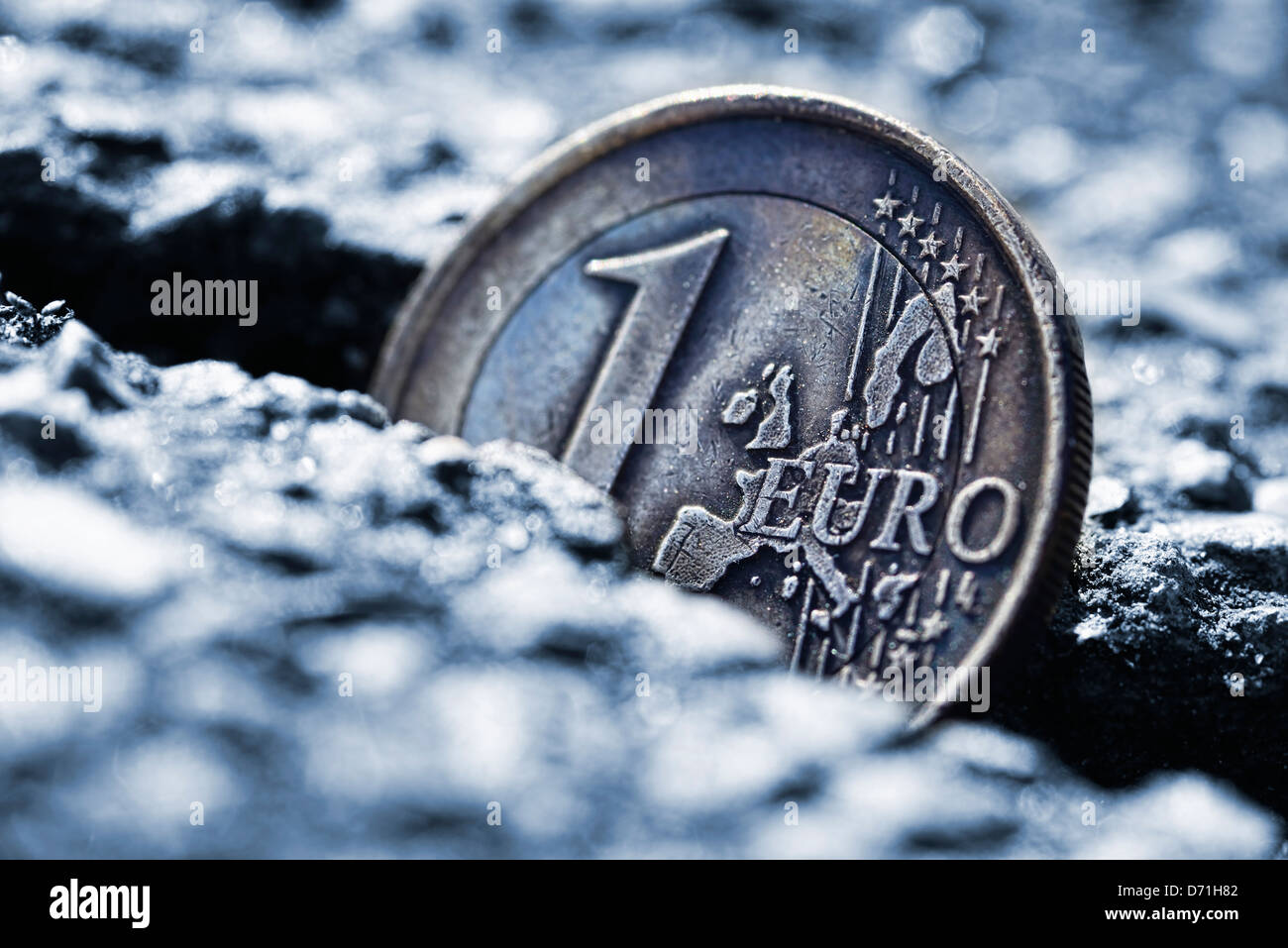 Euro-coin one in fissure, eurocrisis Stock Photo