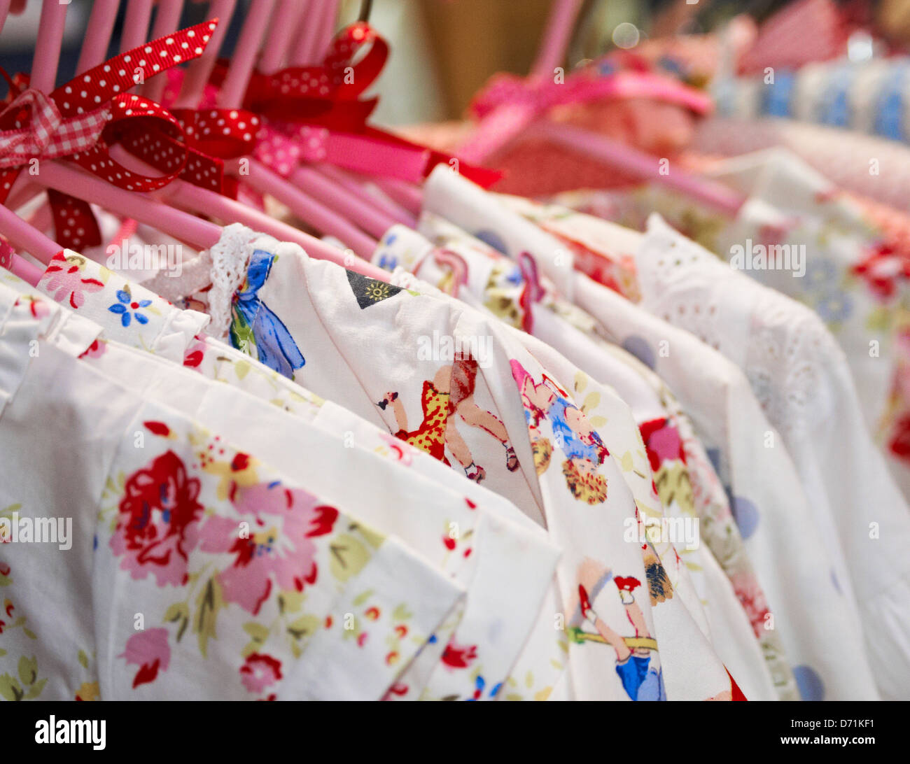 Children's pyjamas on a clothes rail at vintage market Stock Photo