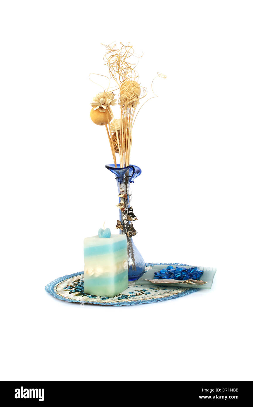 Blue vase with flowers, candle, ashtray, table overlay isolated on white background Stock Photo