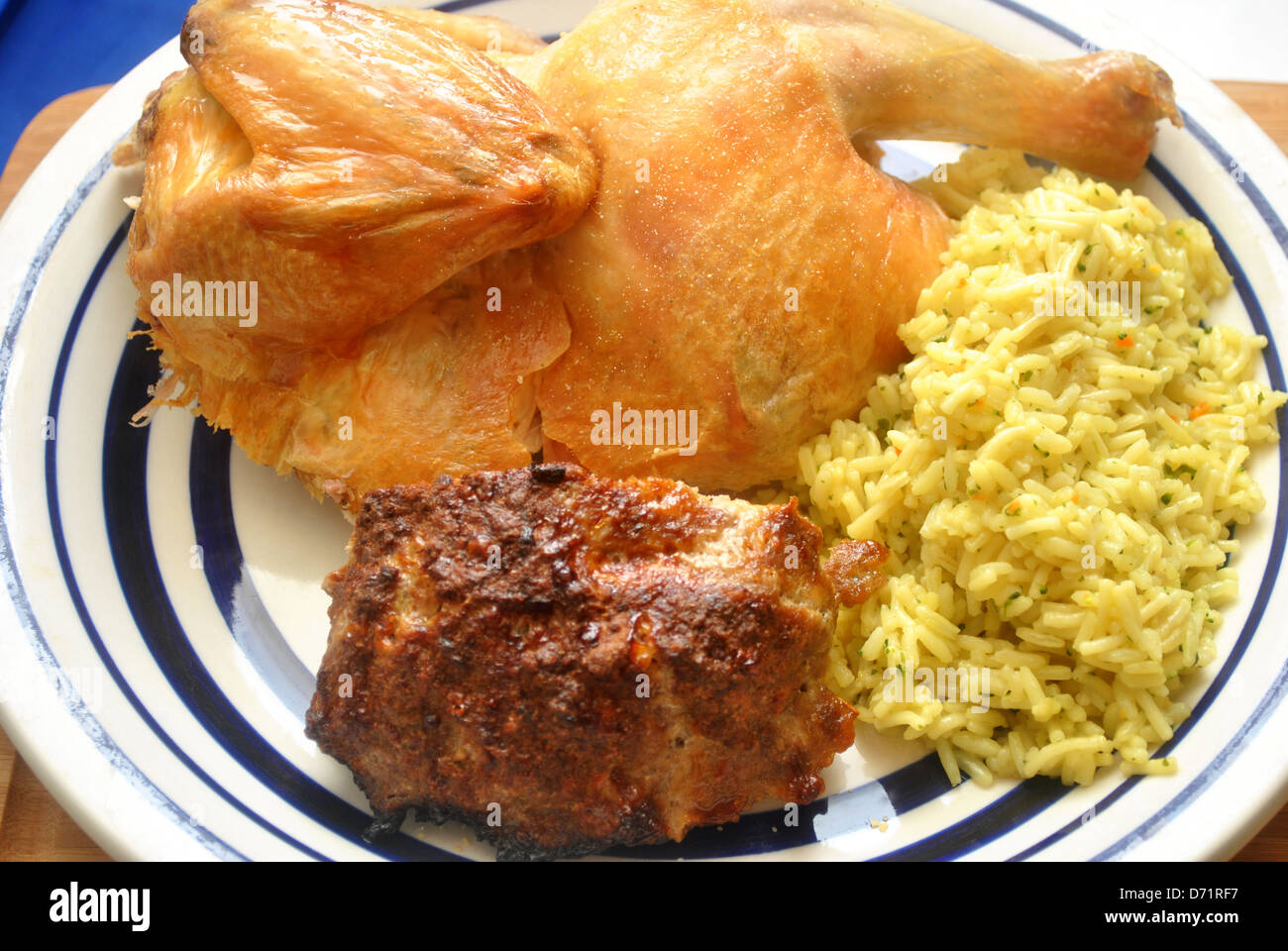 Roasted Chicken Dinner with Pork Meat Stuffing Stock Photo