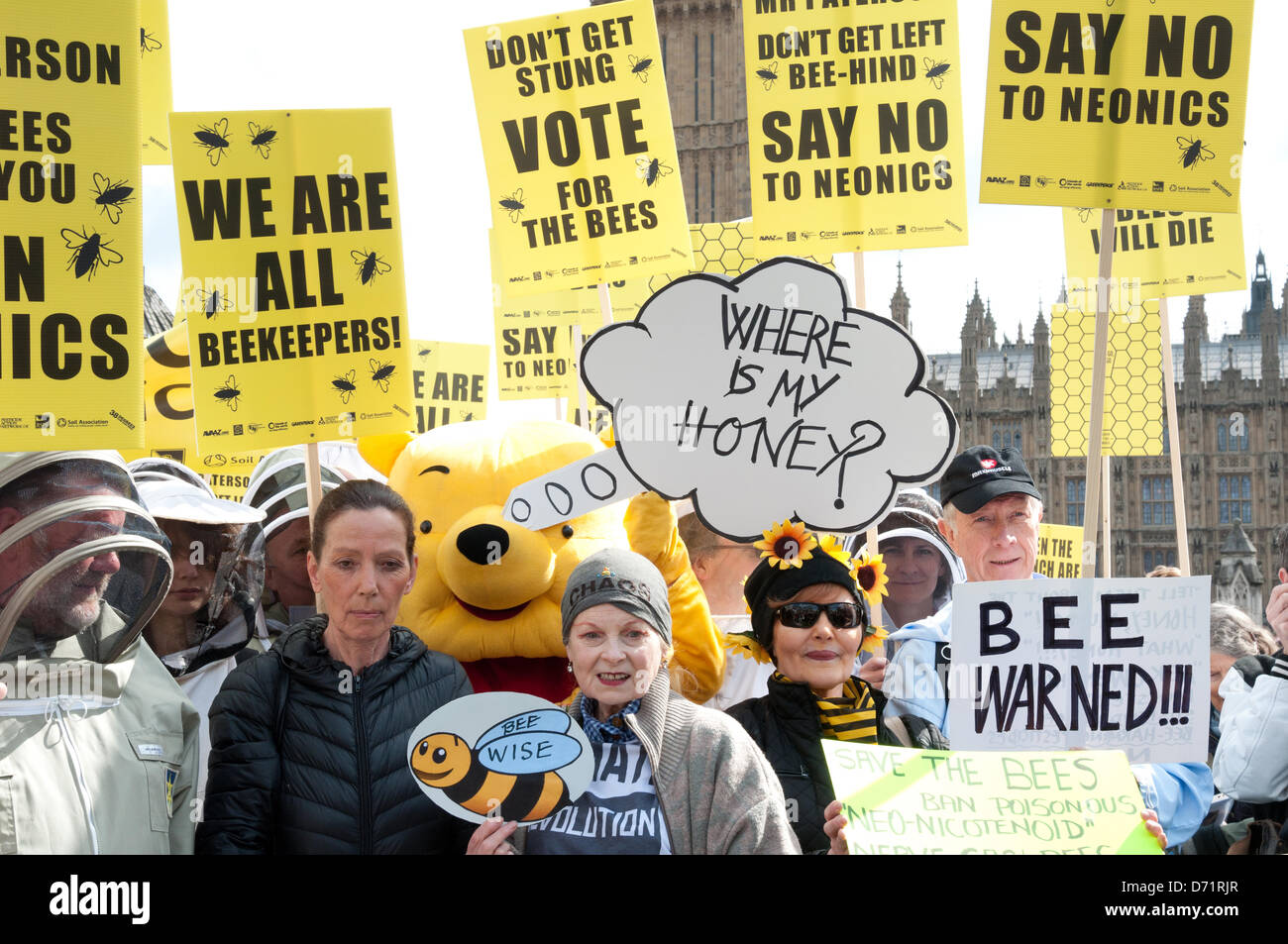 London, England UK 26/04/2013. Designers Katharine Hamnett CBE (second left) and Dame Vivienne Westwood (third left) join beekeepers and fancy dressed supporters take to Parliament Square to call for a European ban on neonicotinoid pesticides. Organisers hope to persuade Rt Hon Owen Paterson MP, Secretary of State for Environment and Rural Affairs, to support a EU vote banning the bee harming neonicotinoid pesticides on Monday 29th April. Stock Photo