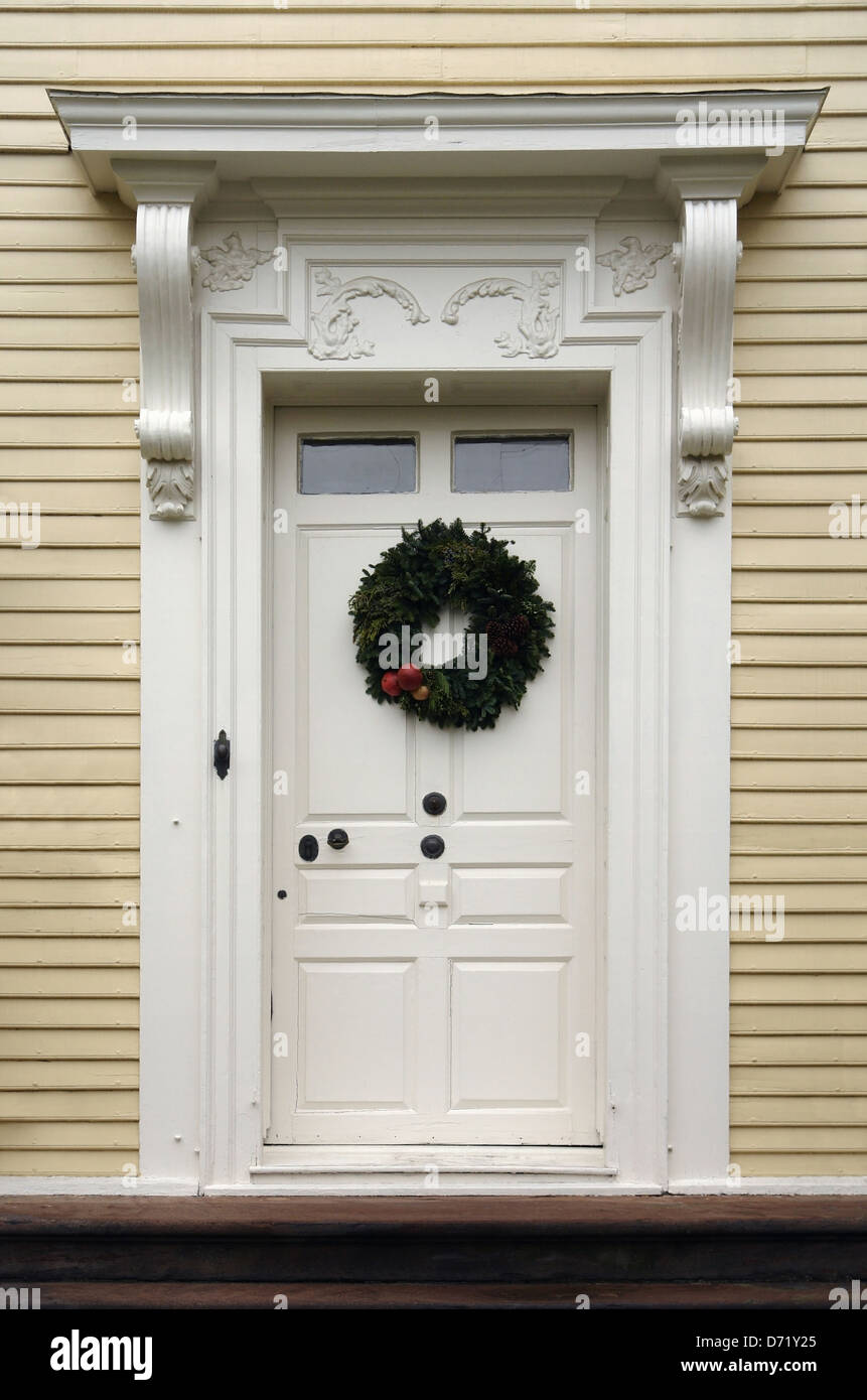 frontal shot of a ornamented wooden door Stock Photo