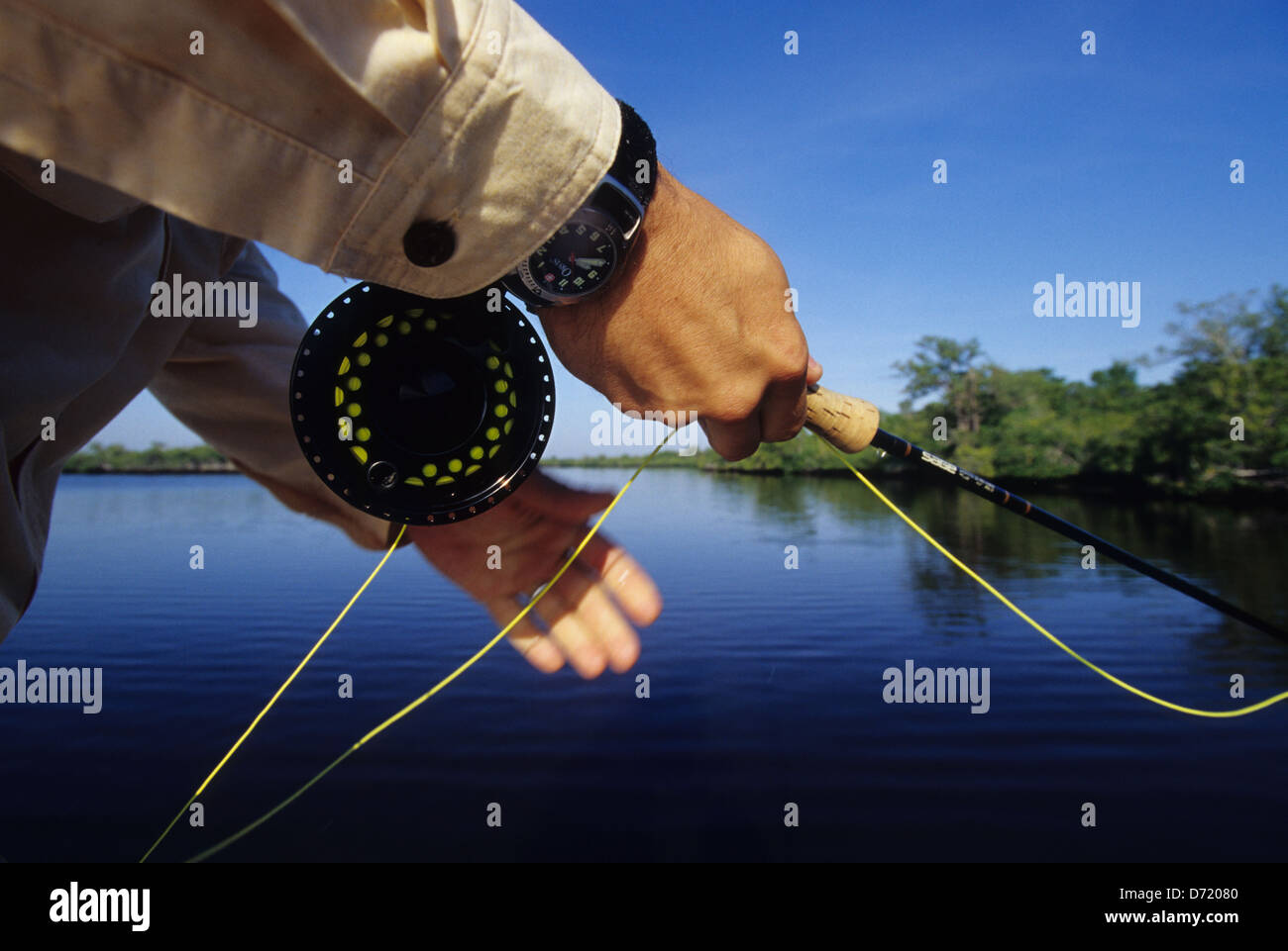 A fly fisherman fishing for snook and tarpon in the Florida Everglades near Chokoloskee Florida