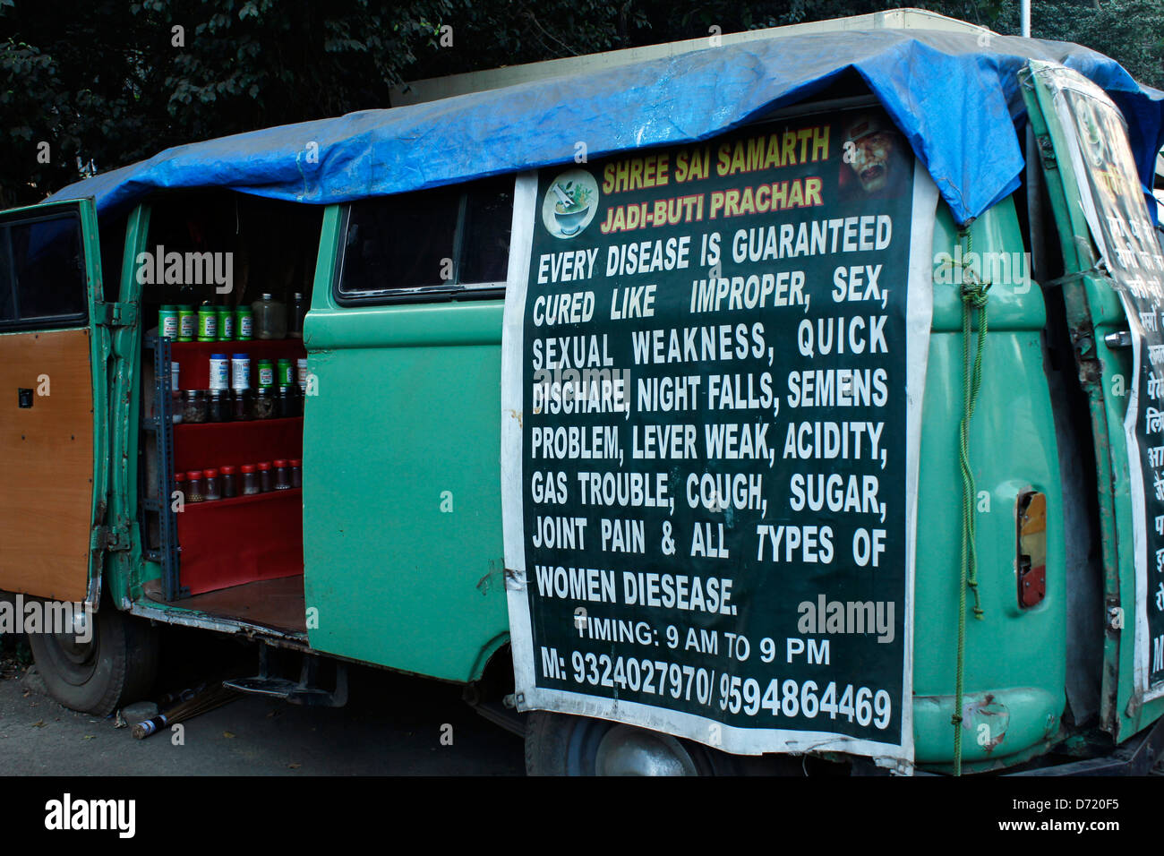 A tribal medicine vehicle with a funny board in Mumbai, India Stock Photo
