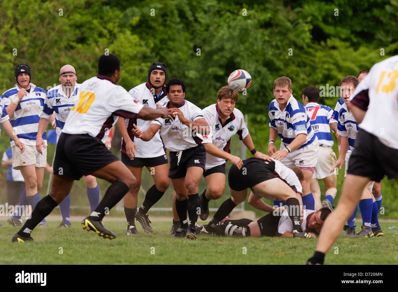 The Old Puget Sound Beach Rugby Football and Washington Rugby Football clubs battle during a match at Cardozo High School field. Stock Photo