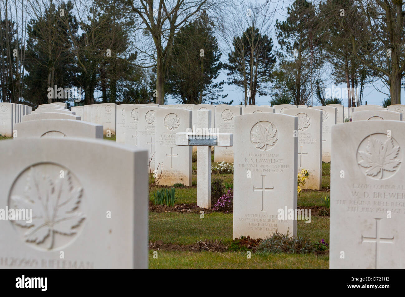 Grave of a French soldier in Canadian cemetery of second war (1939-1945) in Beny-sur-mer, Normandy, France Stock Photo