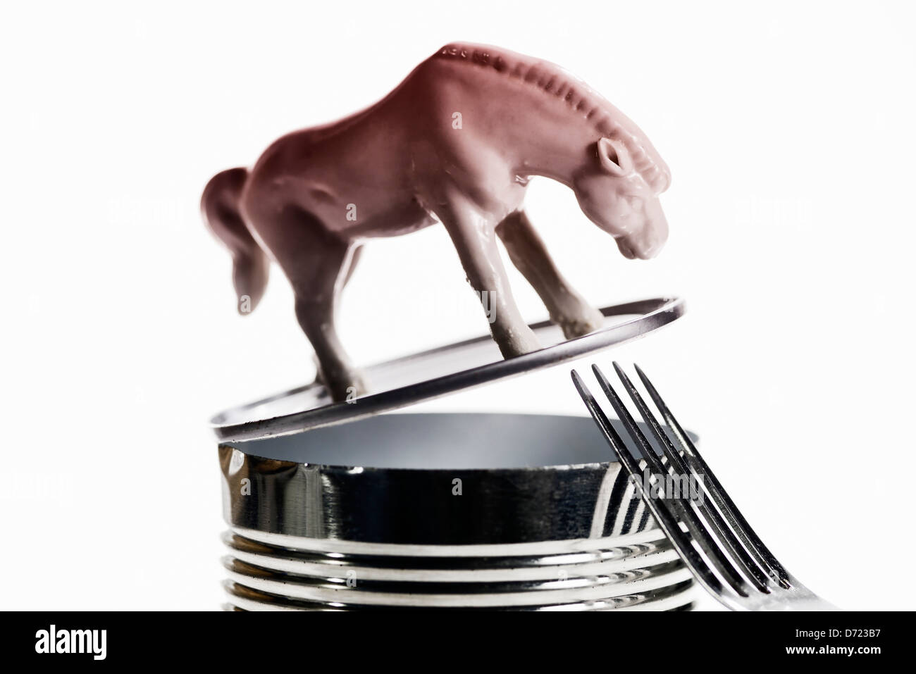 Horse figure on canned food tin, horsemeat Stock Photo