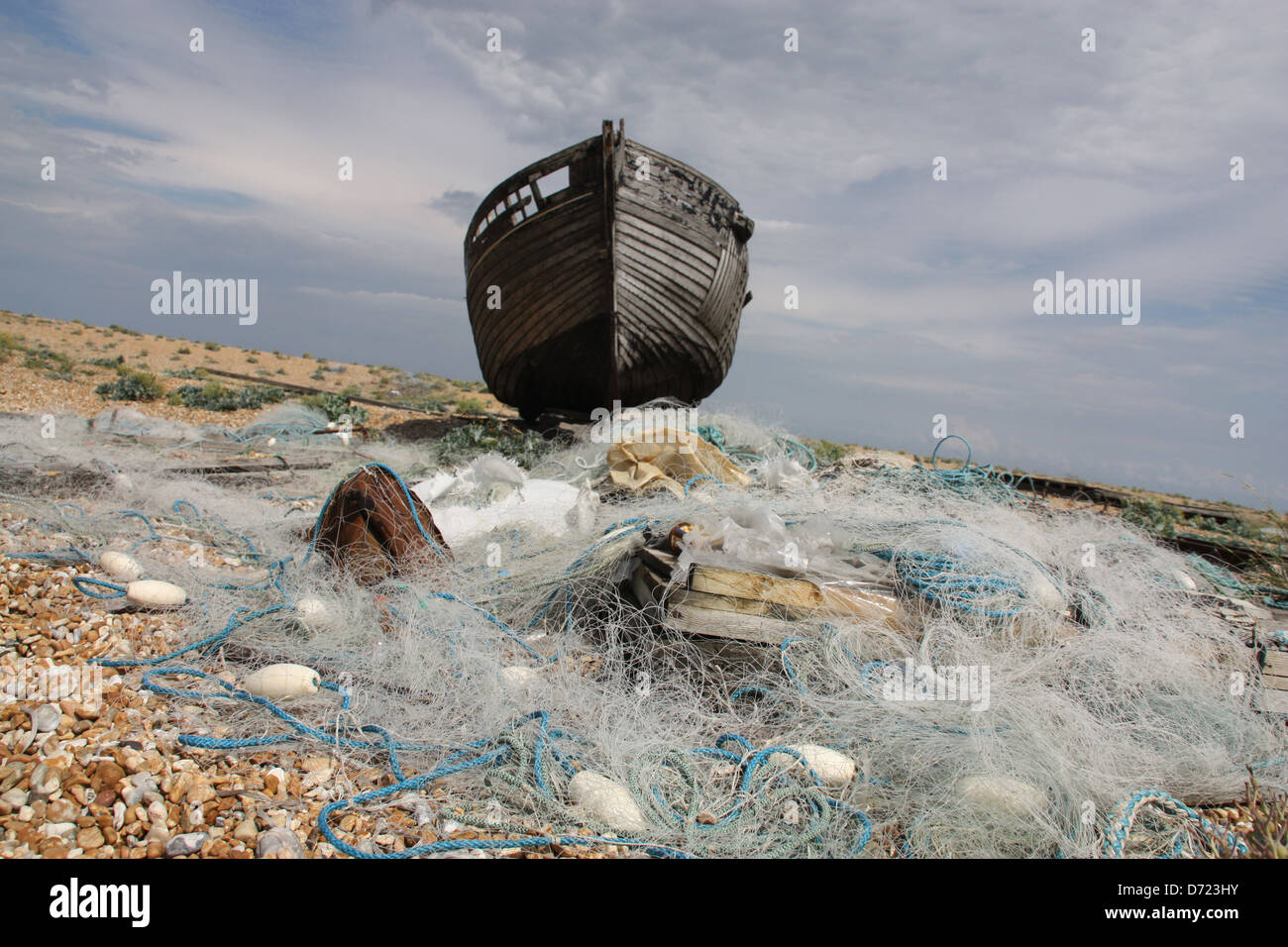 Old wrecked fishing boat stranded on Dungeness shingle beach with ...