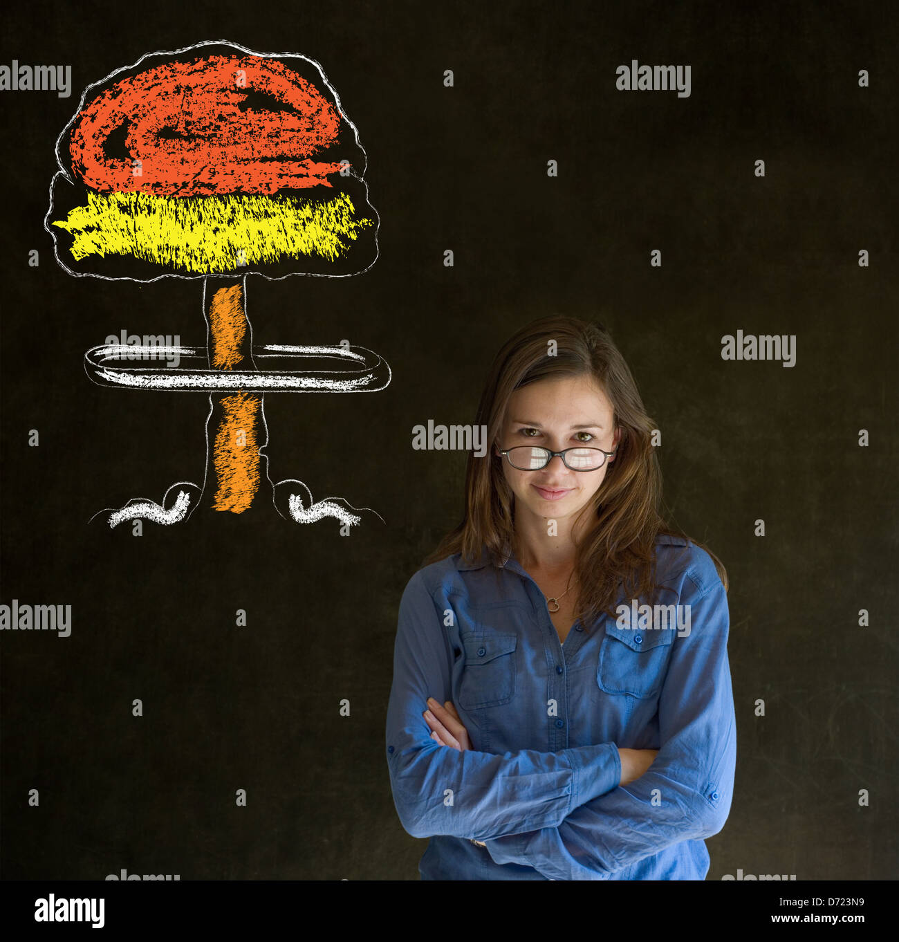 Business woman, student or teacher with thought thinking chalk nuclear bomb cloud on blackboard background Stock Photo