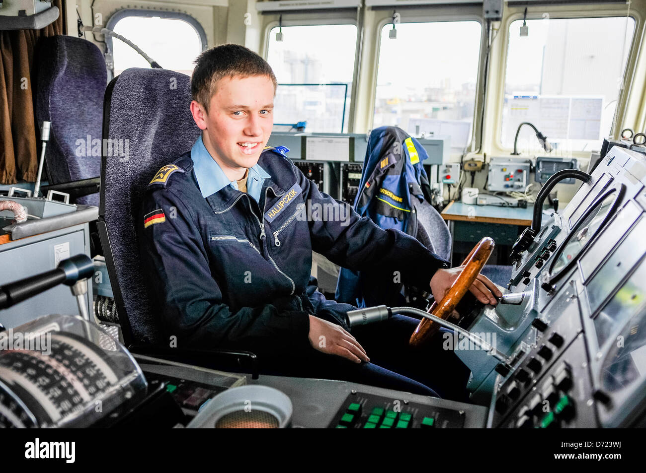 Belfast, Northern Ireland. 26th April 2013.  Fähnrich zur See (Midshipman) Halupczok from the German Navy mans the helm of FGS Weilheim from the Standing NATO Mine Countermeasures Group 1 (SNMCG1). Credit: Stephen Barnes/Alamy Live News Stock Photo
