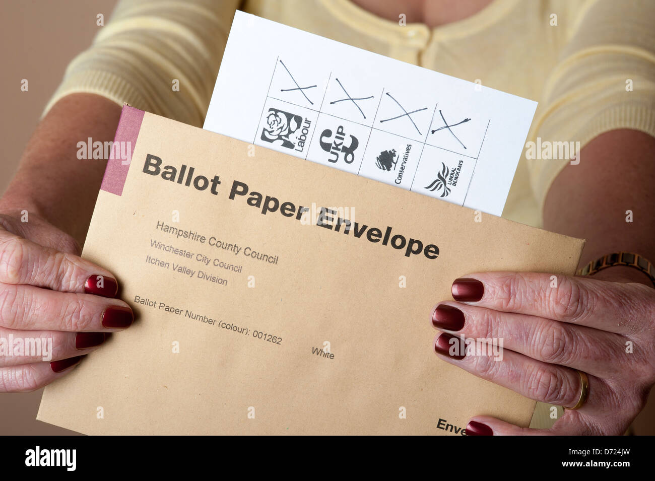Spoiled voting paper where elector has marked a cross for each of four candidates Stock Photo
