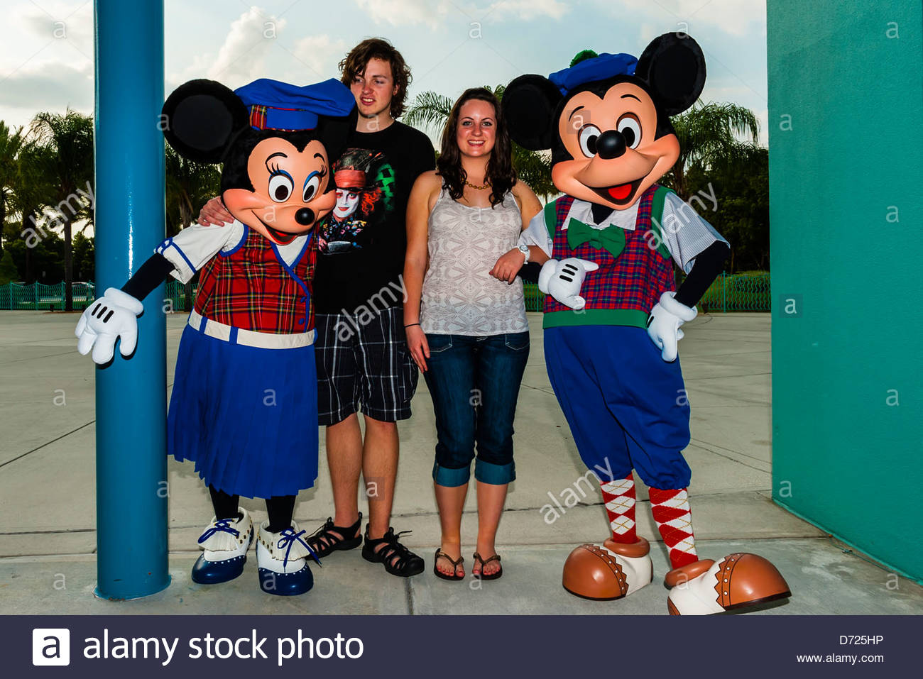 Mickey Mouse And Minnie Mouse With Teenagers Fantasia Gardens