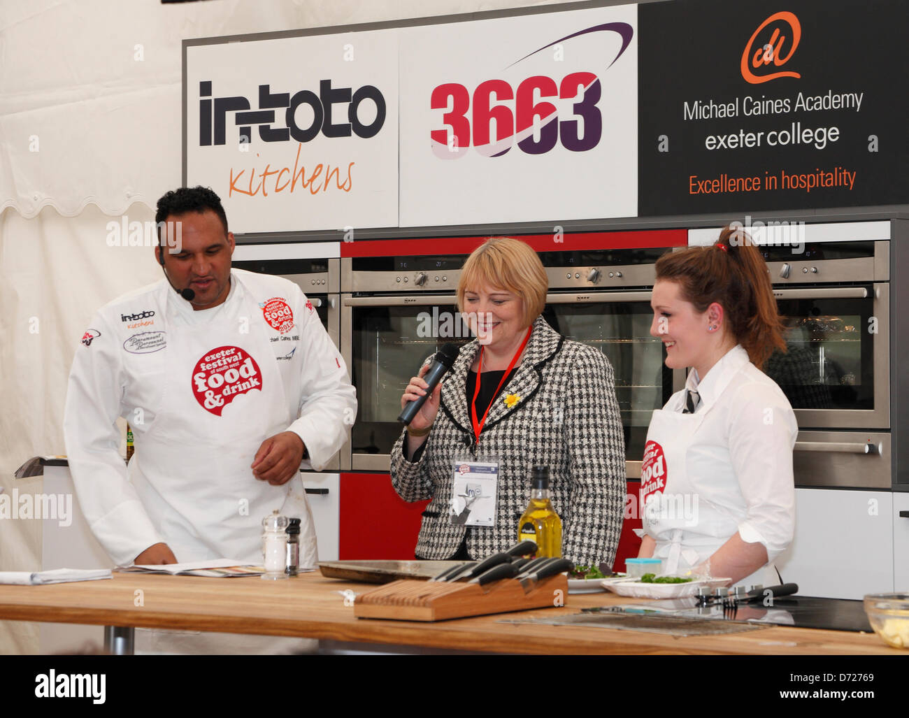 Exeter, UK. 26 April 2013. Celebrity chef Michael Caines at The Exeter Festival of Southwest Food and Drink compering the Great Student Cookoff  For Students of the Michael Caines Academy at Exeter College UK. Credit: Anthony Collins/Alamy Live News Stock Photo