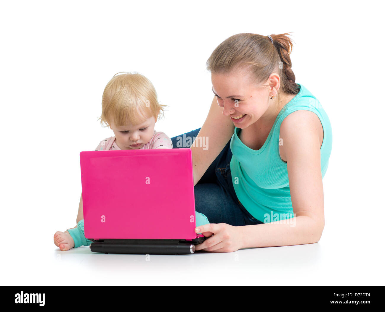 mother and child working at laptop Stock Photo
