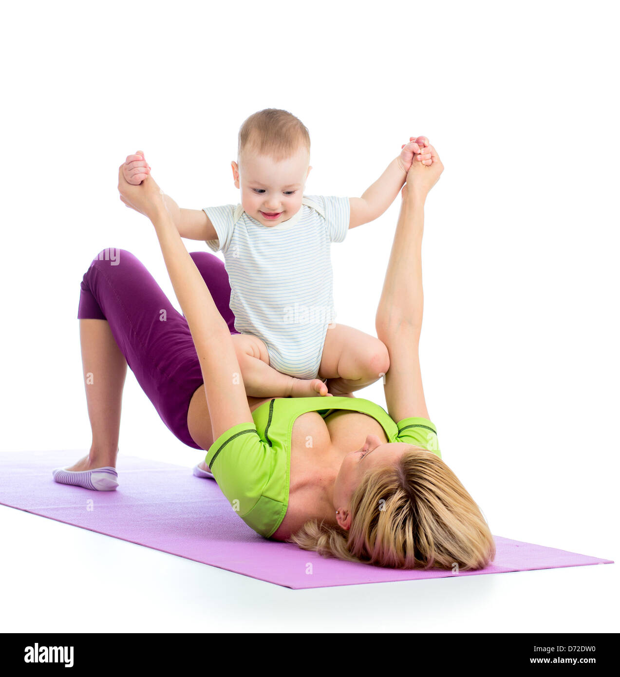 mother with baby doing gymnastics and fitness exercises Stock Photo
