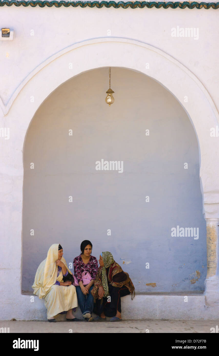 People in Mausoleum and Medrasa of Abi Zamaa Alo-Balawi, Kairouan, Tunisia Stock Photo