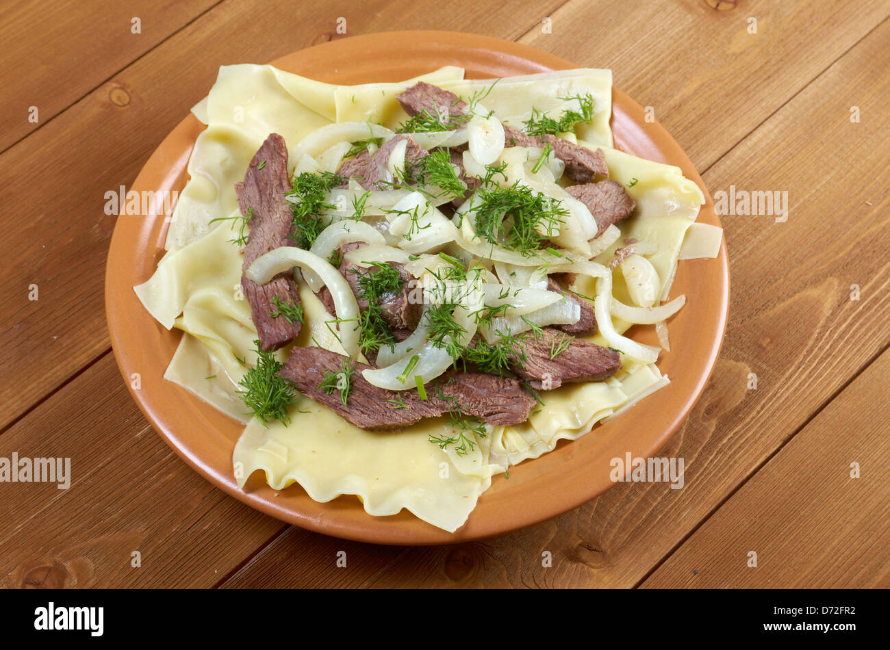 Beshbarmak: Traditional meat asian cuisine Stock Photo - Alamy