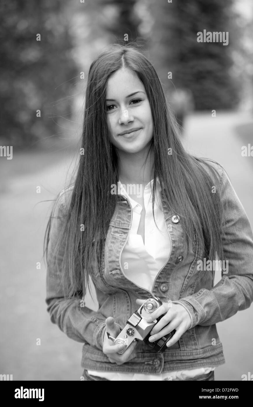 Cool young photogrpaher girl with analog camera Stock Photo Alamy