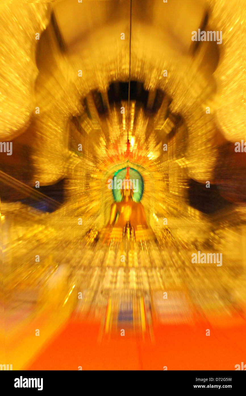 Buddhist holy Buddha bathed in rays of light. Stock Photo