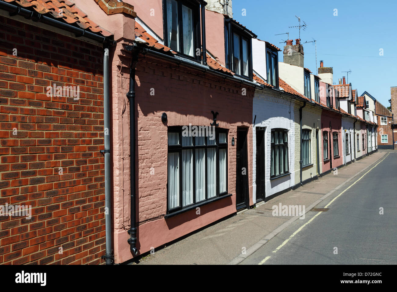 A row of colourful houses in church street Southwold, Suffolk Stock Photo